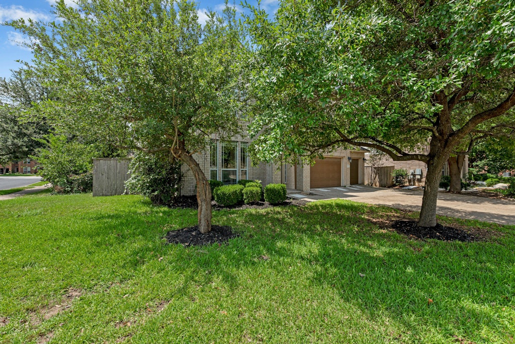 903 Fork Ridge Path Round Rock, TX 78665 - Photo 2 of 35 a front view of house with yard and green space