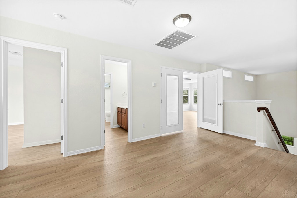 903 Fork Ridge Path Round Rock, TX 78665 - Photo 24 of 35 a view of a livingroom with wooden floor