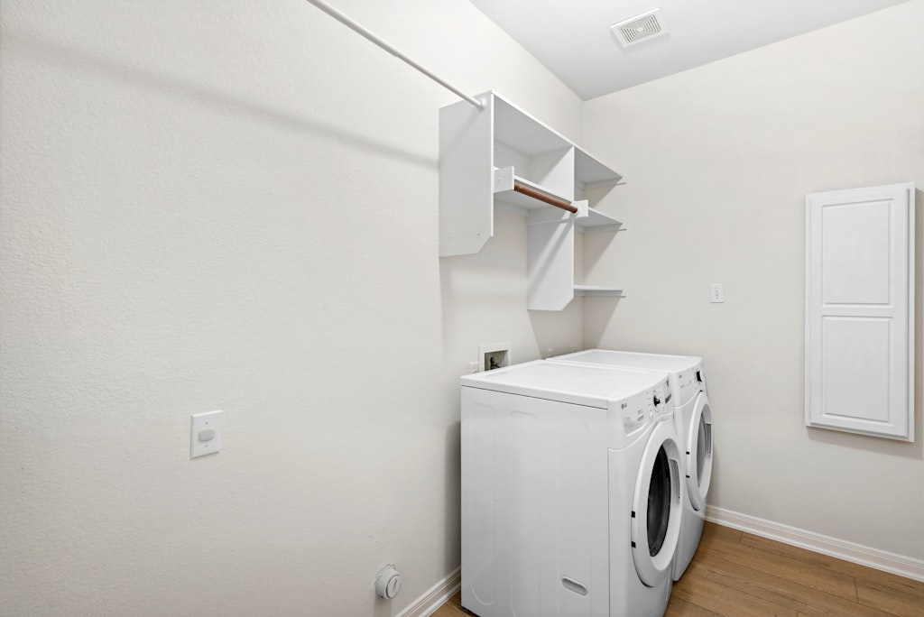 903 Fork Ridge Path Round Rock, TX 78665 - Photo 27 of 35 a utility room with dryer and washer