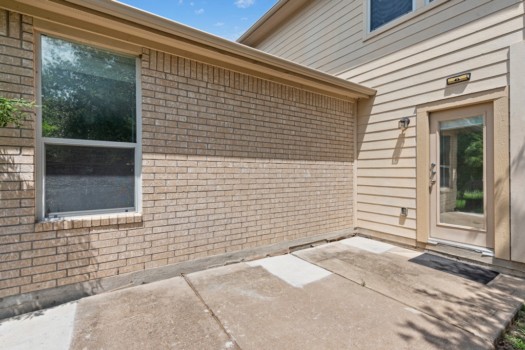 903 Fork Ridge Path Round Rock, TX 78665 - Photo 33 of 35 a view of a door and a window