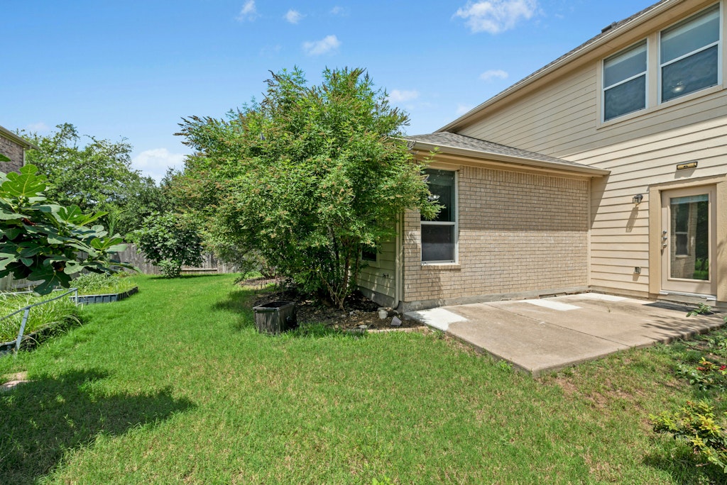 903 Fork Ridge Path Round Rock, TX 78665 - Photo 34 of 35 a view of backyard of house with green space