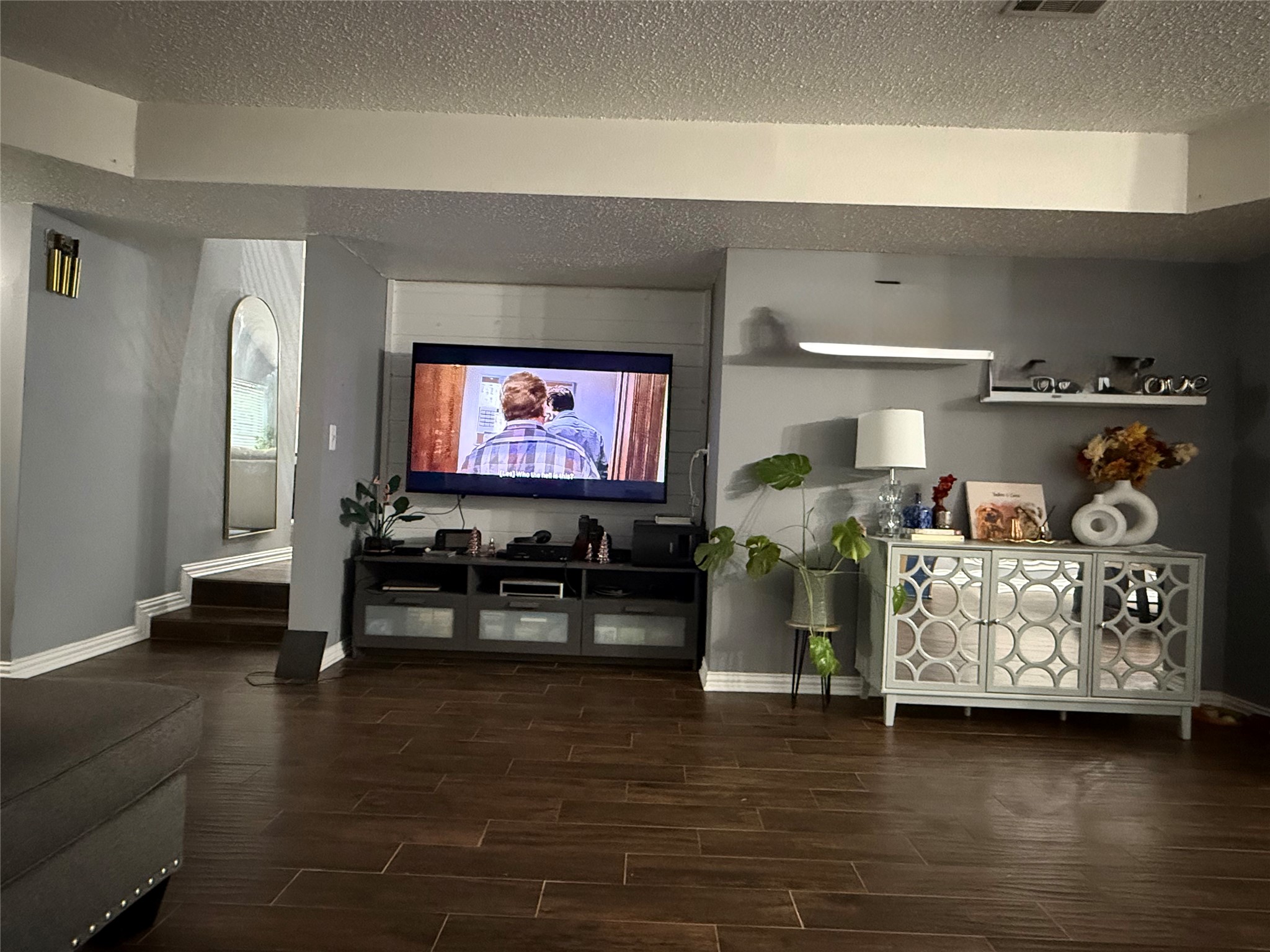 4211 Bridledon Lane Houston, TX 77014 - Photo 5 of 17 a living room with furniture and a flat screen tv