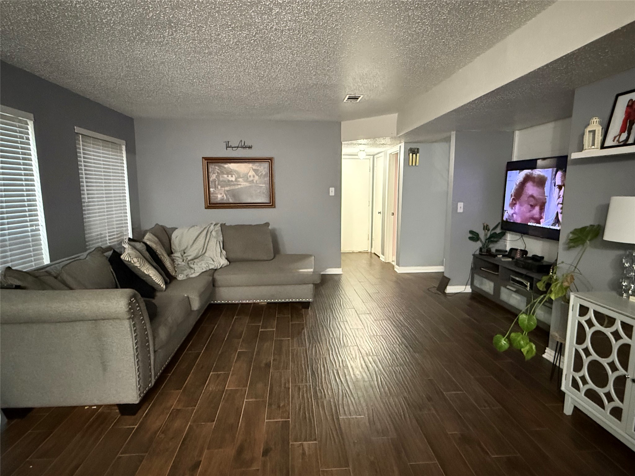 4211 Bridledon Lane Houston, TX 77014 - Photo 6 of 17 a living room with furniture and a wooden floor