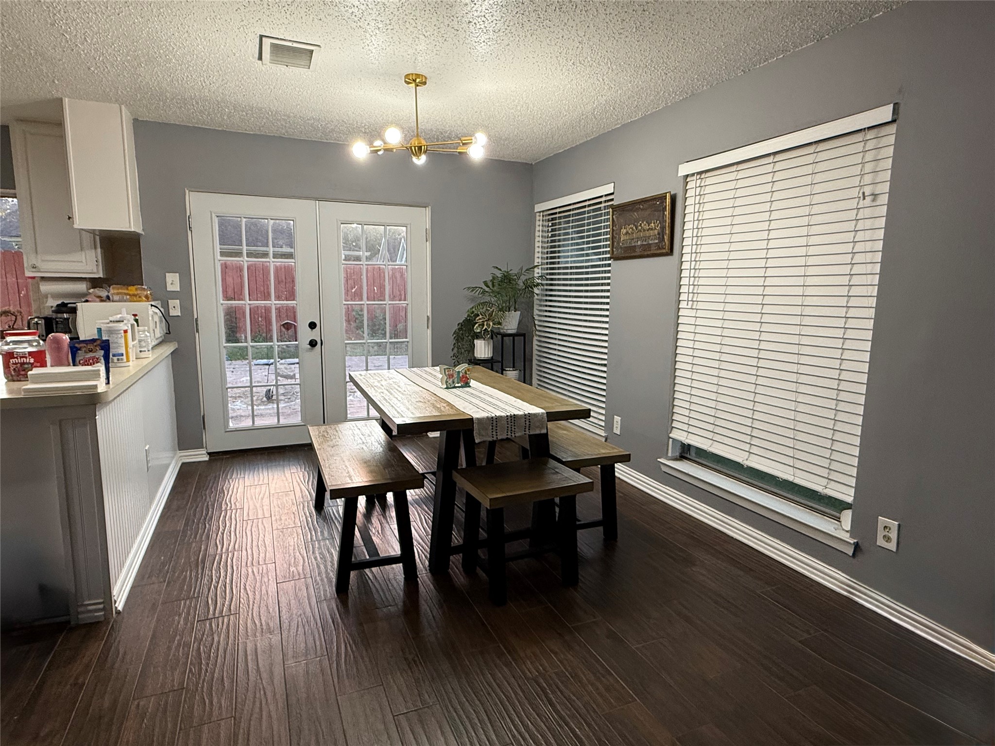 4211 Bridledon Lane Houston, TX 77014 - Photo 7 of 17 a view of a dining room with furniture and wooden floor