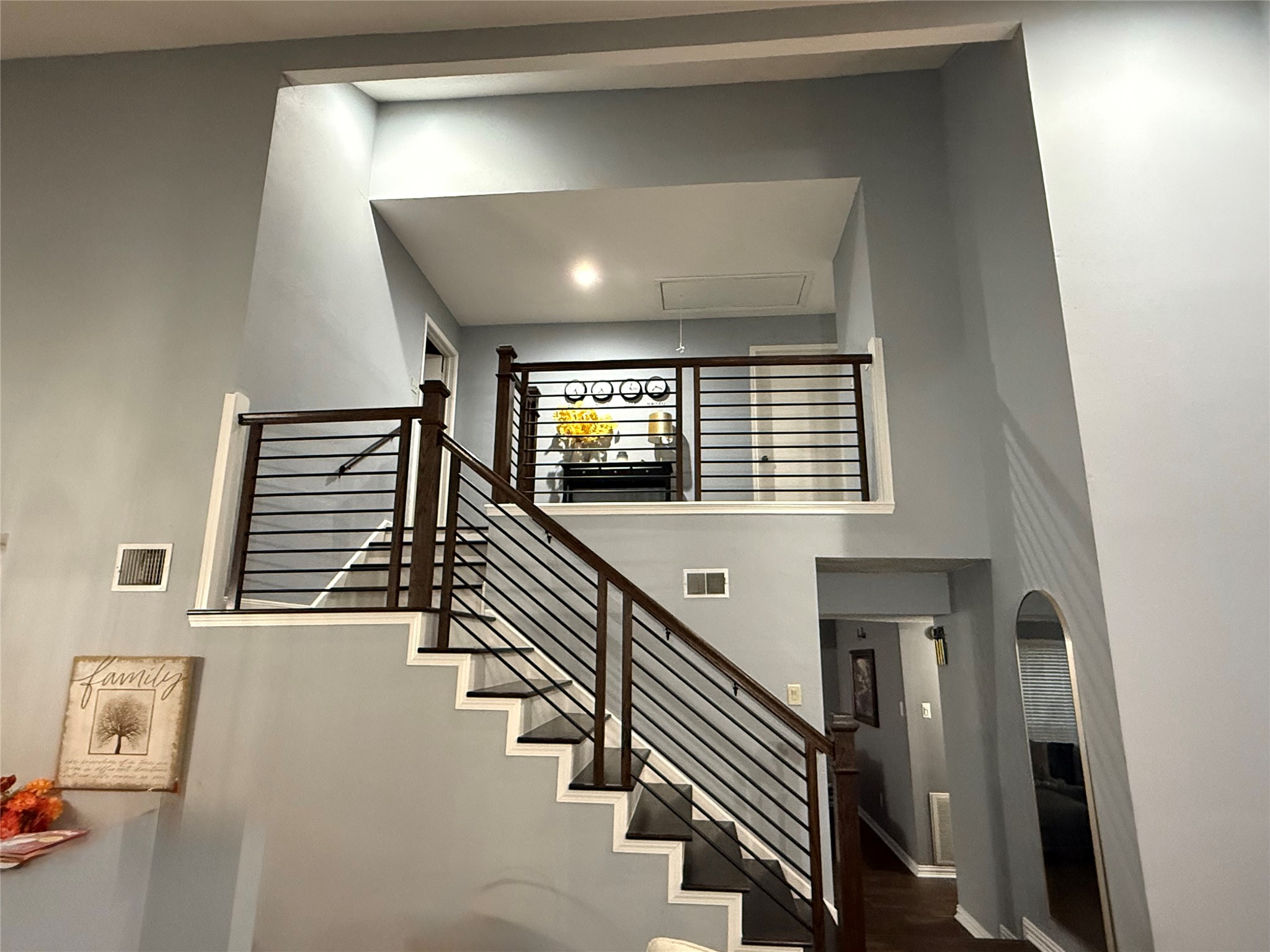 4211 Bridledon Lane Houston, TX 77014 - Photo 10 of 17 a view of entryway and hall with wooden floor