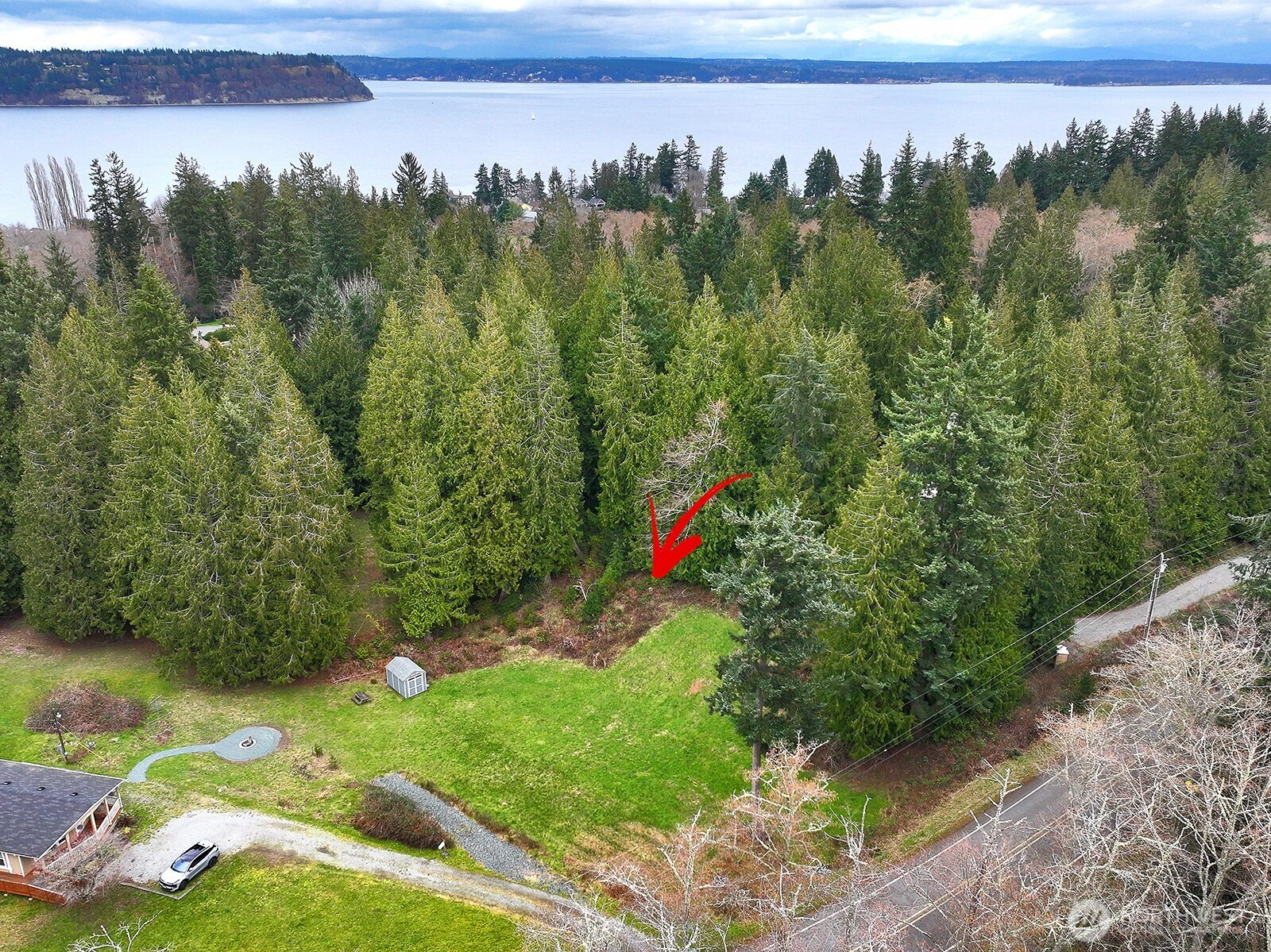 4985 Wilkinson Road Langley, WA 98260 - Photo 2 of 14 a view of a outdoor space and a lake view