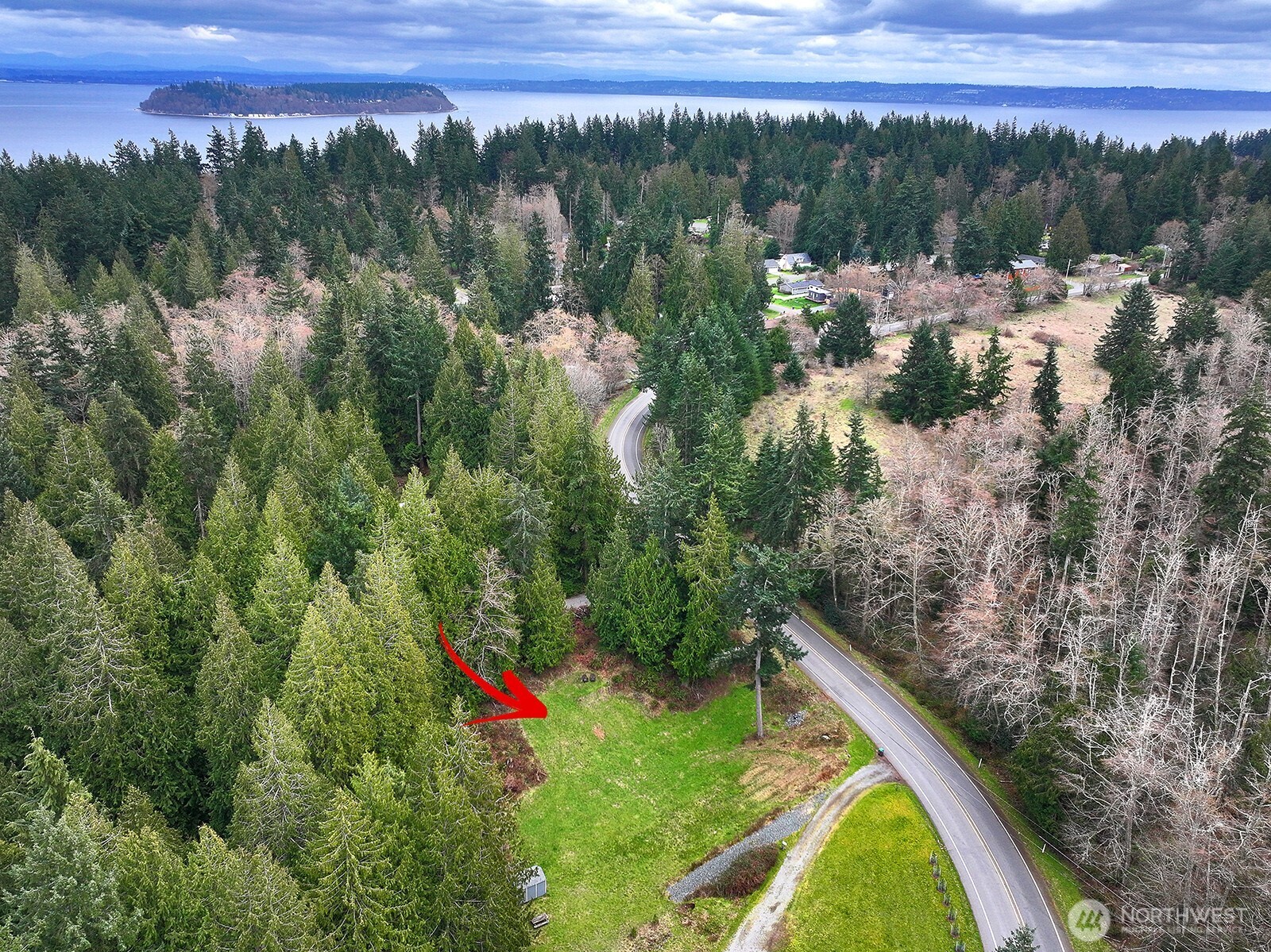 4985 Wilkinson Road Langley, WA 98260 - Photo 2 of 14 a view of a city from a balcony