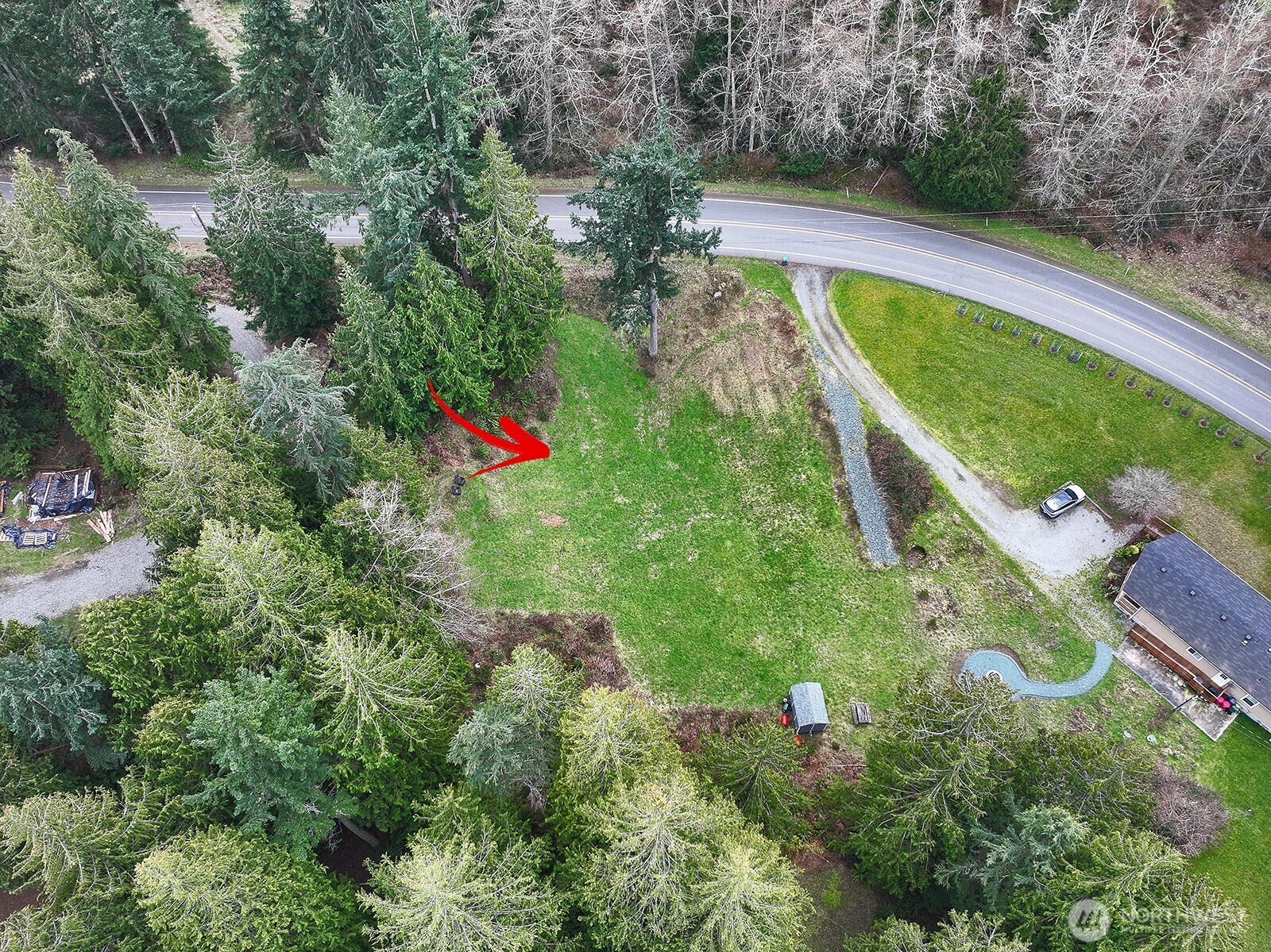 4985 Wilkinson Road Langley, WA 98260 - Photo 5 of 14 an aerial view of residential house with outdoor space and trees all around