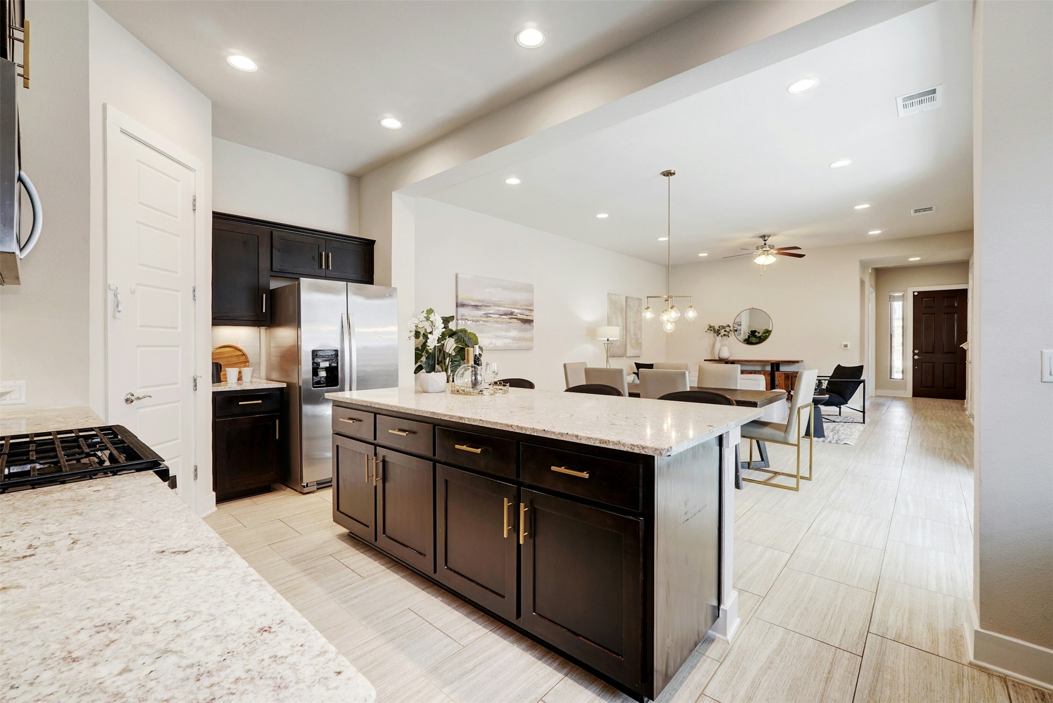 1603 Arcilla Street Austin, TX 78741 - Photo 17 of 36 a kitchen with a sink and cabinets