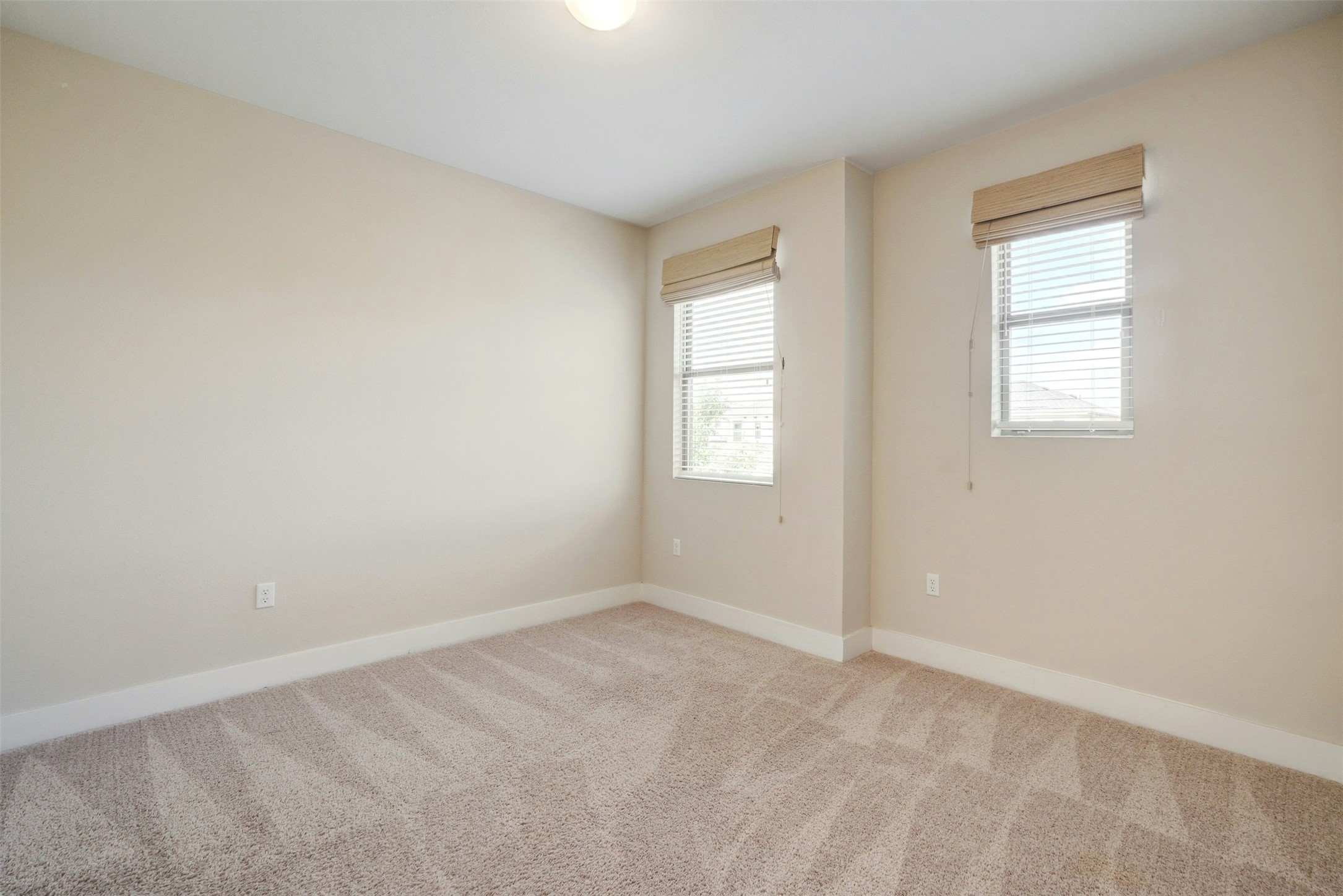 1603 Arcilla Street Austin, TX 78741 - Photo 28 of 36 an empty room with windows