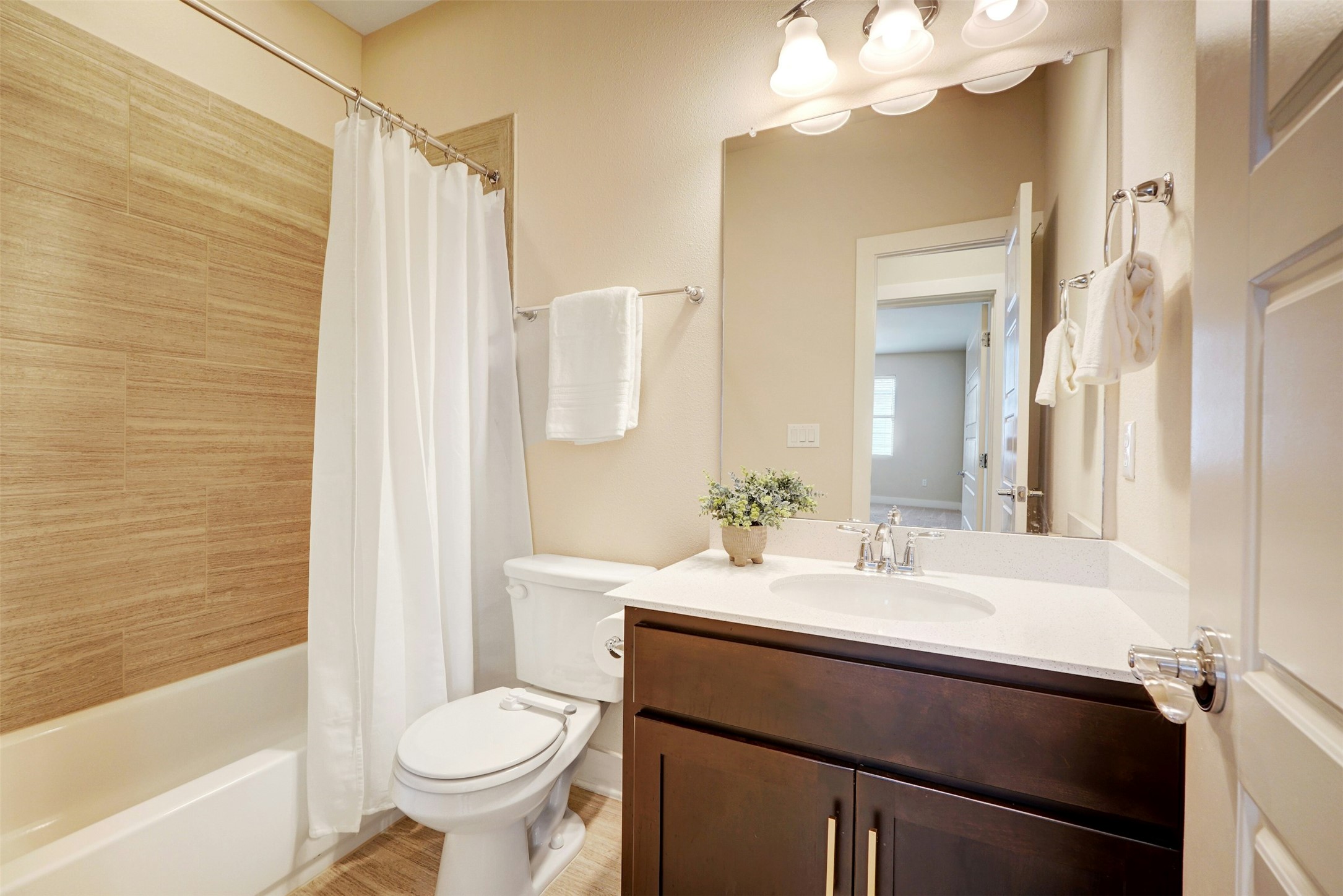 1603 Arcilla Street Austin, TX 78741 - Photo 29 of 36 a bathroom with a sink a toilet and shower
