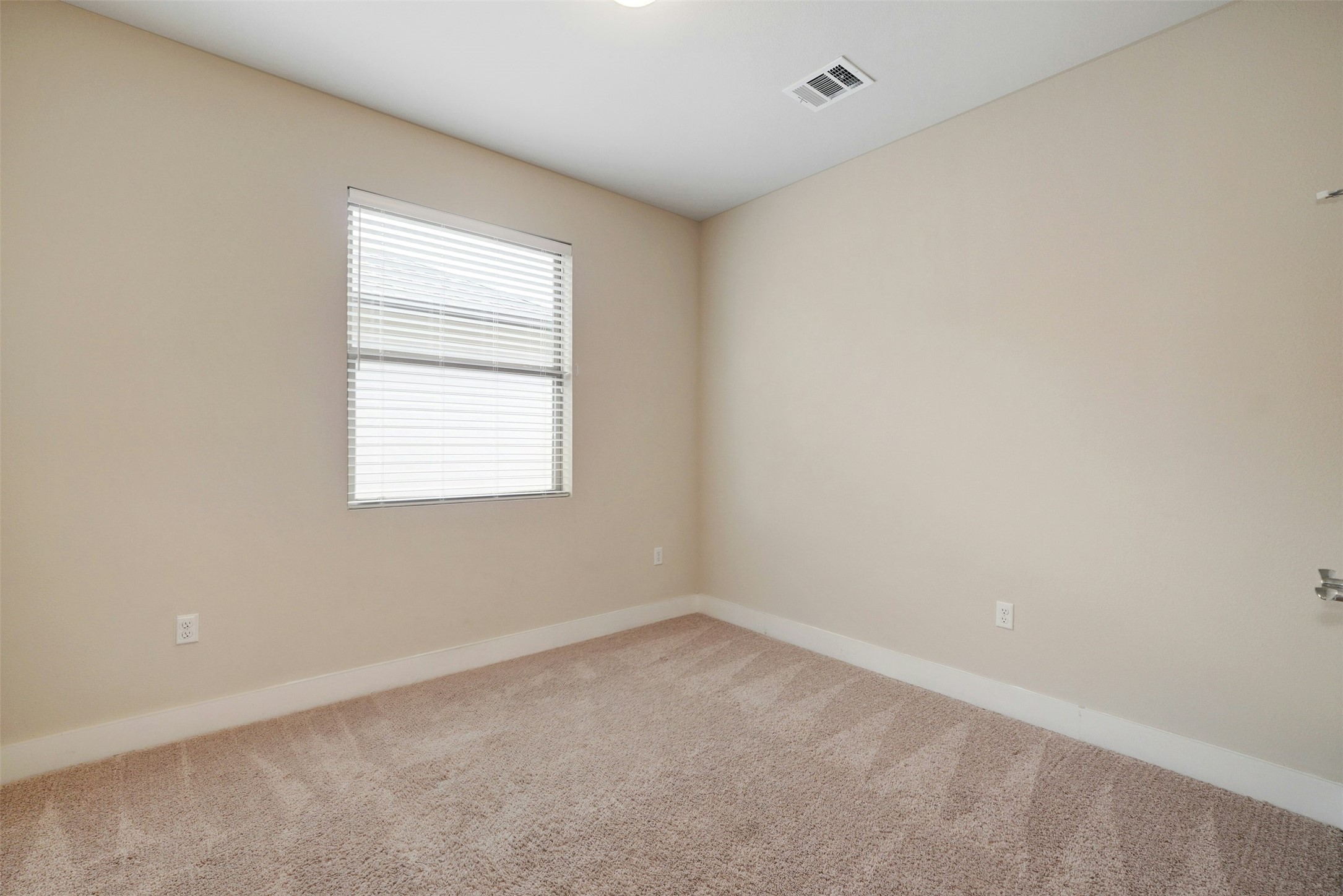 1603 Arcilla Street Austin, TX 78741 - Photo 30 of 36 an empty room with a window