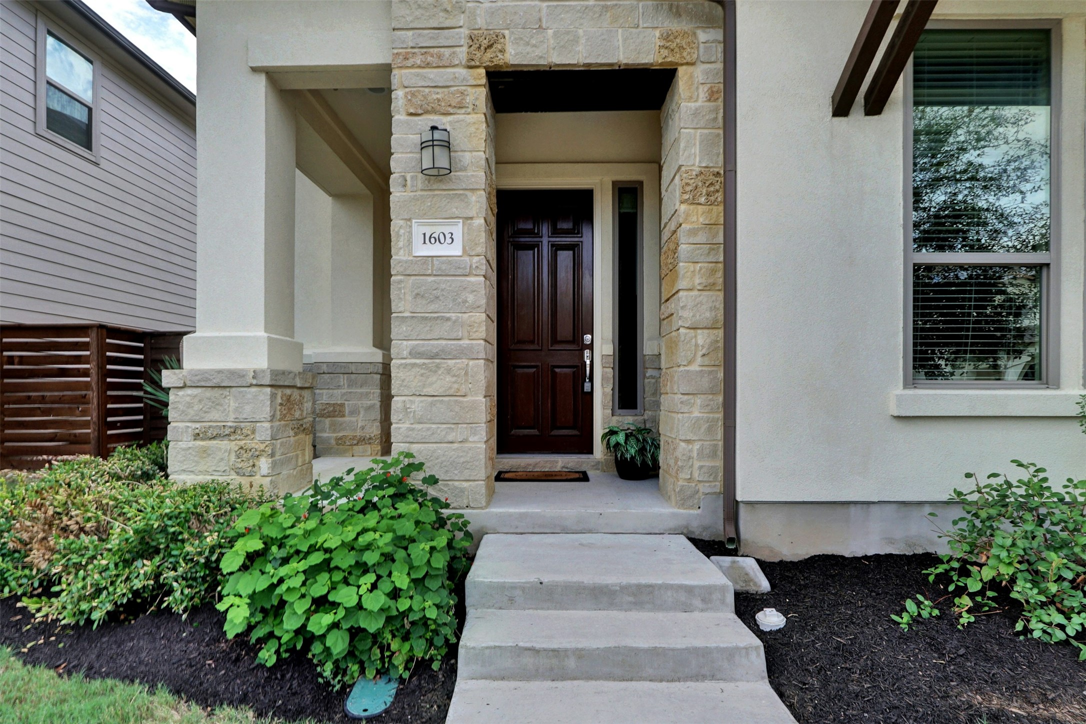 1603 Arcilla Street Austin, TX 78741 - Photo 3 of 36 a view of a pathway besides a building