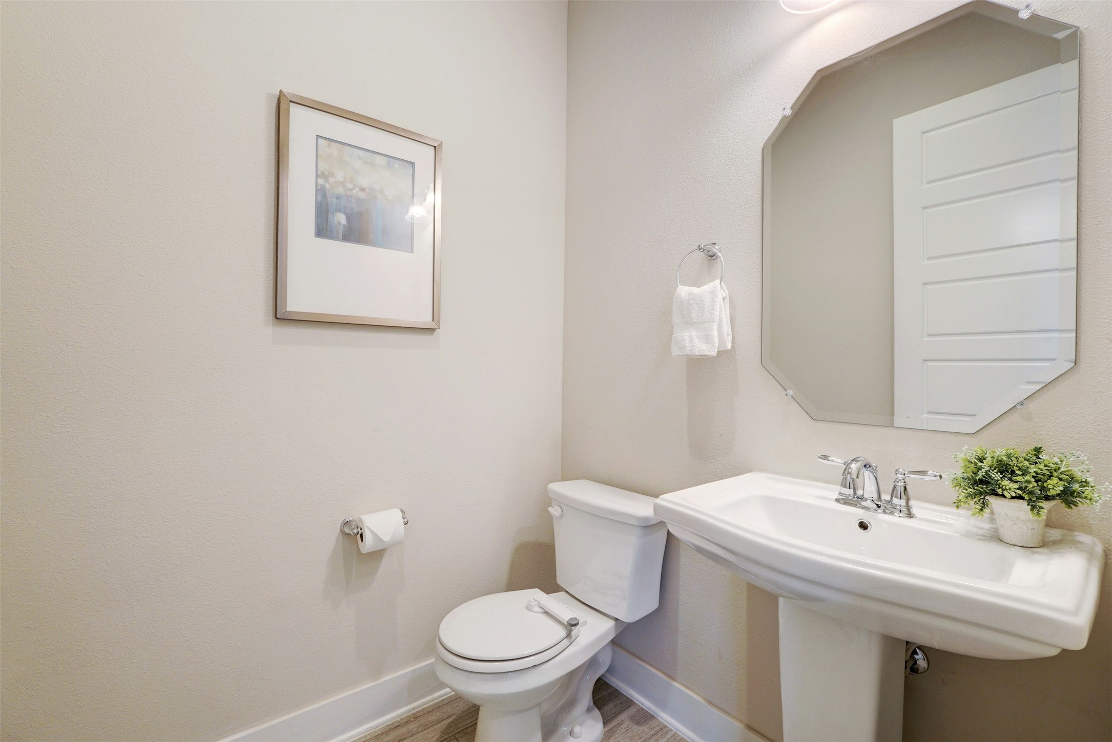 1603 Arcilla Street Austin, TX 78741 - Photo 31 of 36 a bathroom with a sink and a toilet