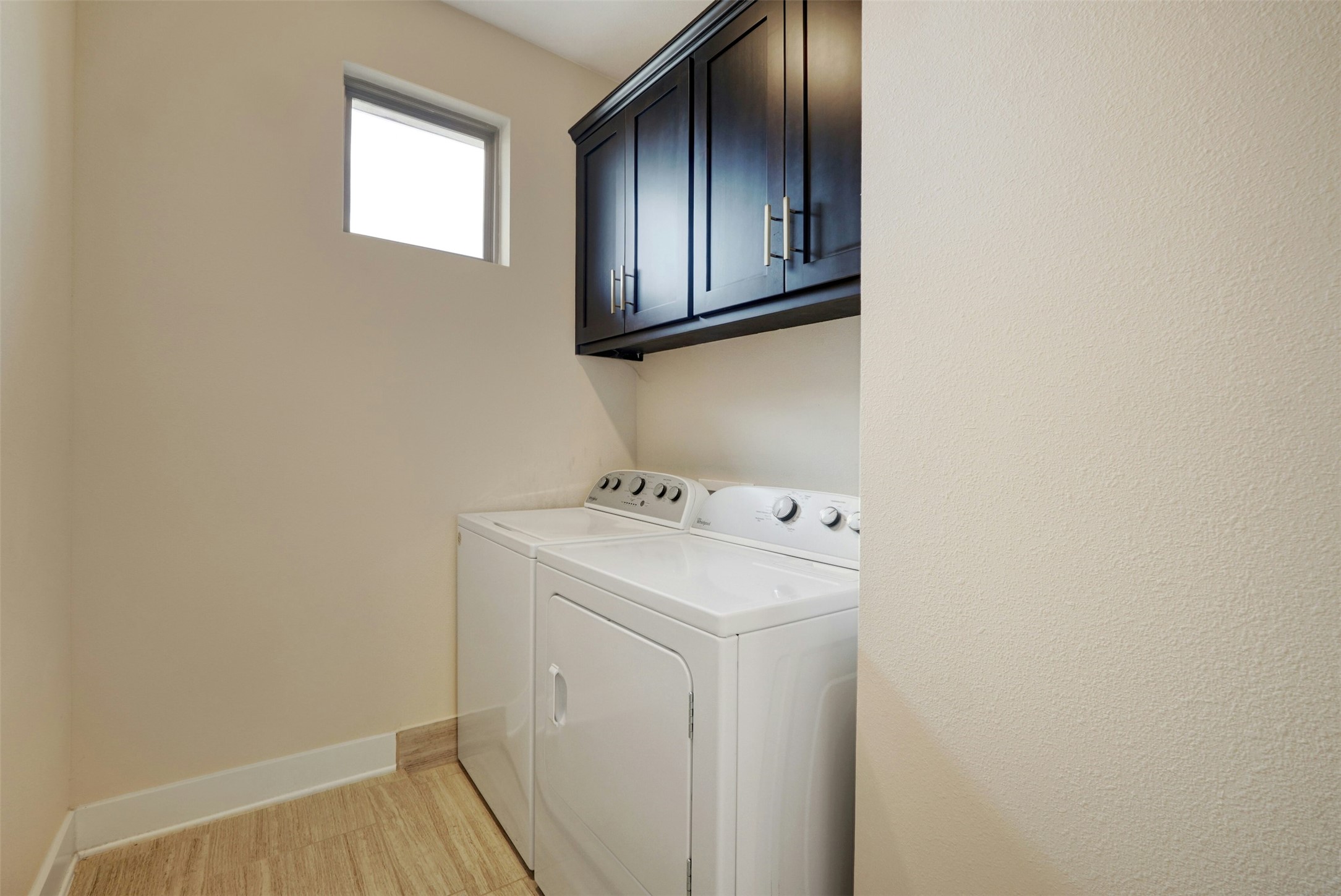 1603 Arcilla Street Austin, TX 78741 - Photo 32 of 36 a utility room with dryer and washer