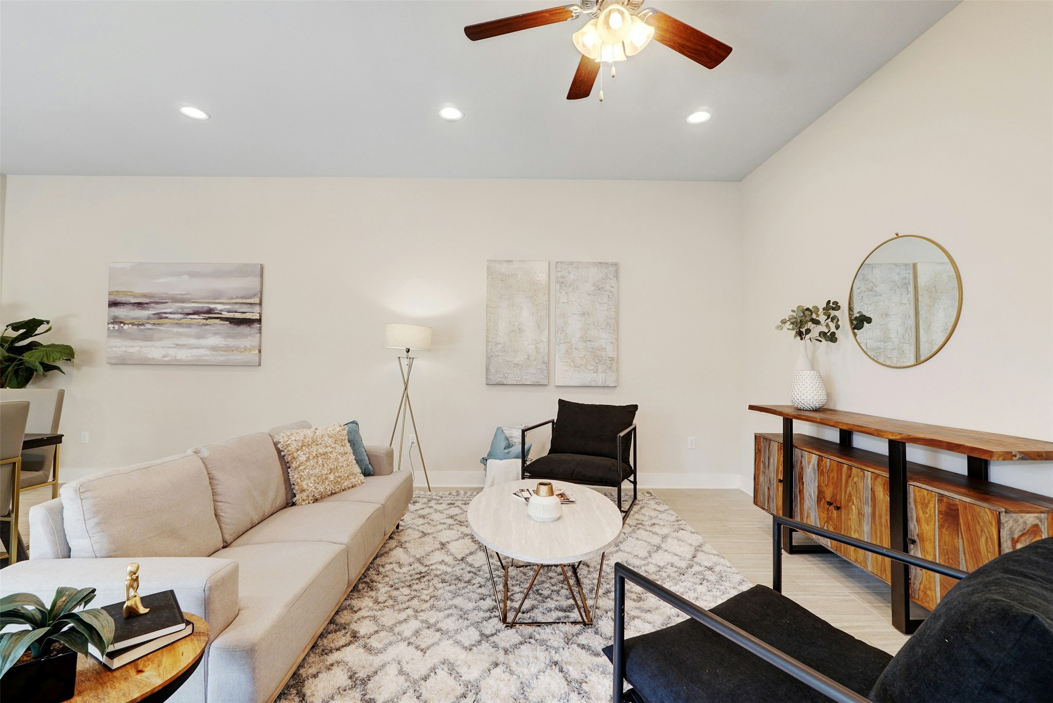 1603 Arcilla Street Austin, TX 78741 - Photo 5 of 36 a living room with furniture a rug and a window