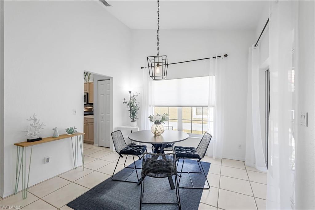 5360 Andover Drive, Unit 202 Naples, FL 34110 - Photo 12 of 25 Breakfast nook off kitchen and adjacent to second Lanai