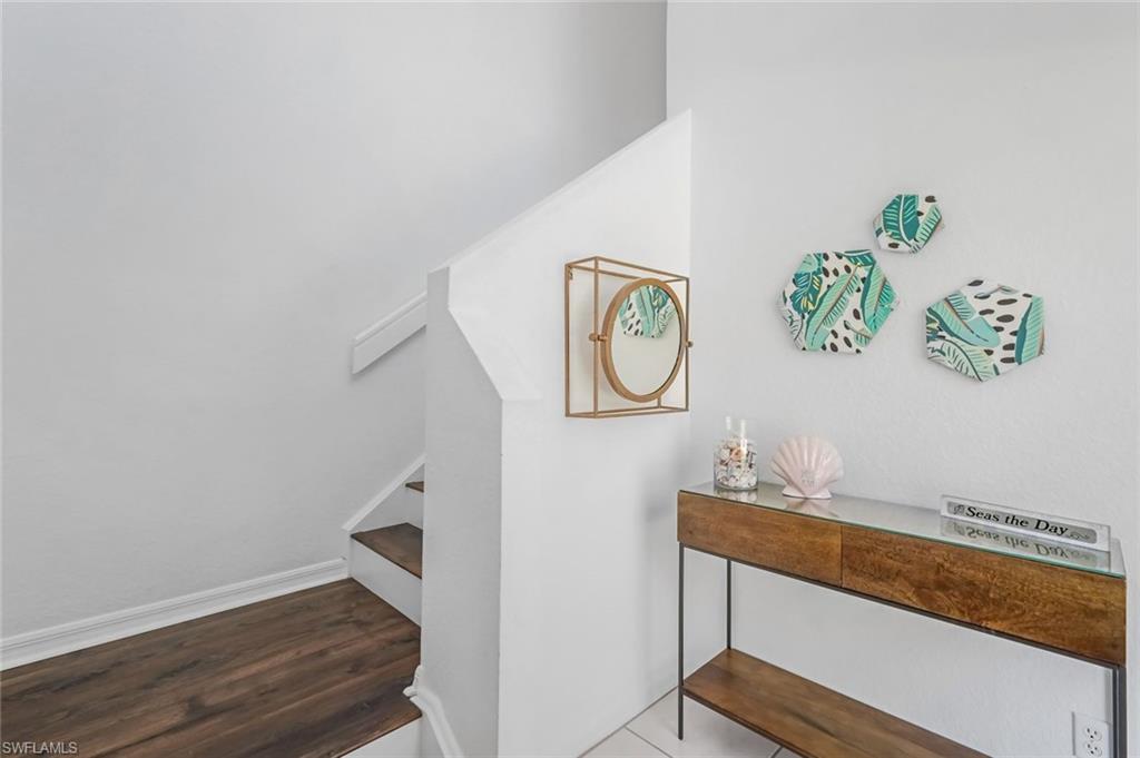 5360 Andover Drive, Unit 202 Naples, FL 34110 - Photo 22 of 25 Front Entrance with Stairs to second floor living space