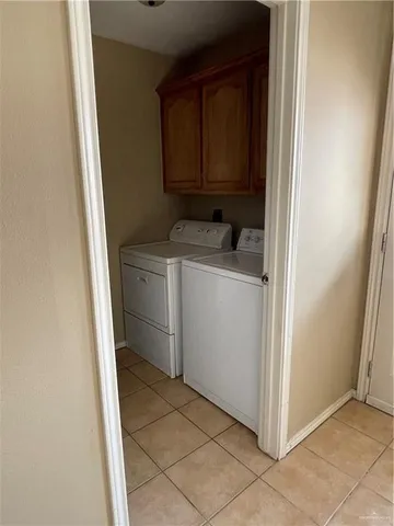 a utility room with a washer and dryer