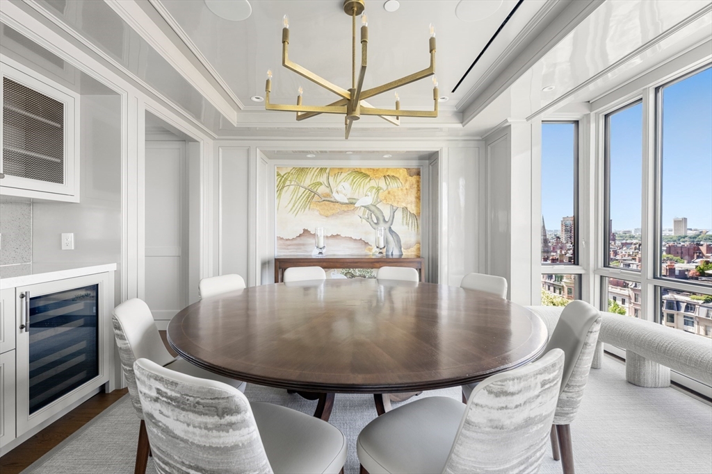 2 Commonwealth Avenue, Unit 11BCD Boston, MA 02116 - Photo 14 of 39 a view of a dining room with furniture window and outside view