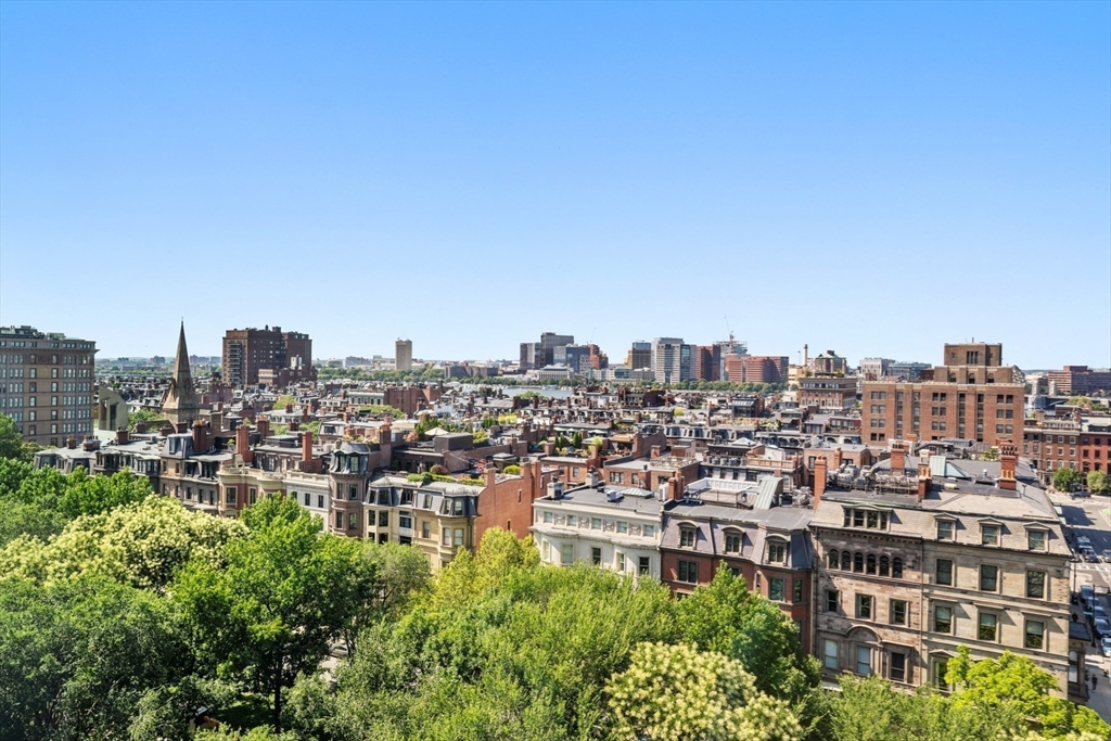 2 Commonwealth Avenue, Unit 11BCD Boston, MA 02116 - Photo 27 of 39 a view of a city with tall buildings in the background