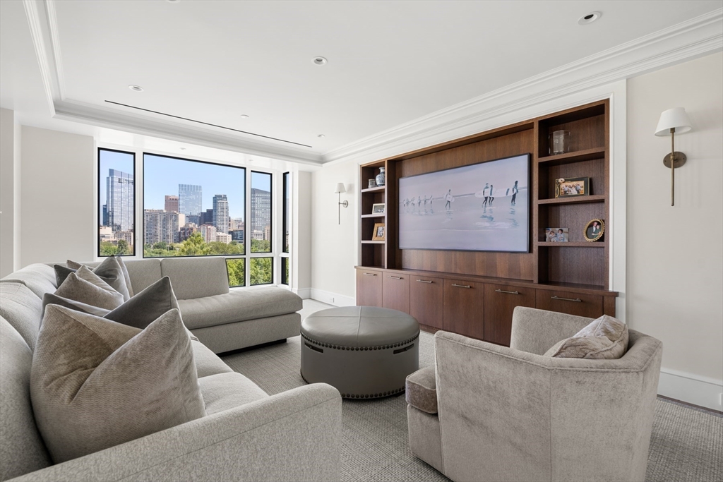 2 Commonwealth Avenue, Unit 11BCD Boston, MA 02116 - Photo 4 of 39 a living room with furniture and a large window