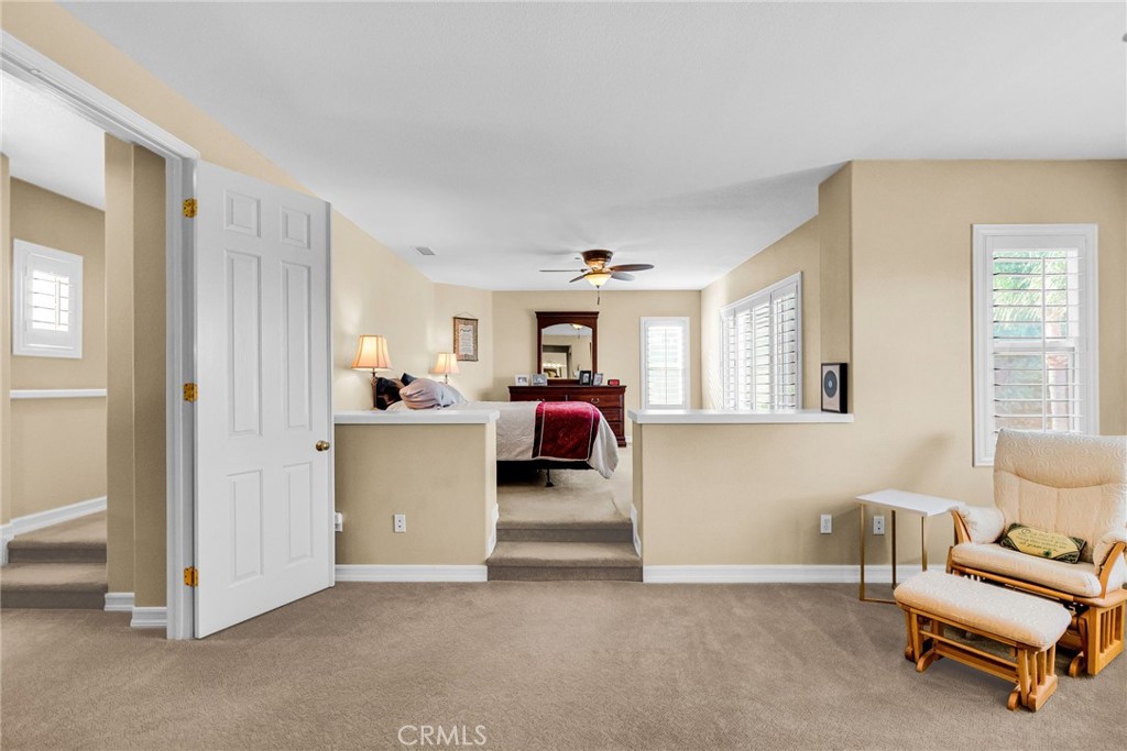 2542 Adage Way Riverside, CA 92506 - Photo 27 of 59 a view of a livingroom with furniture and a window