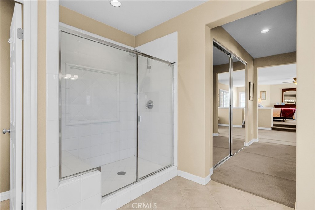 2542 Adage Way Riverside, CA 92506 - Photo 32 of 59 a view of a hallway with wooden shelves