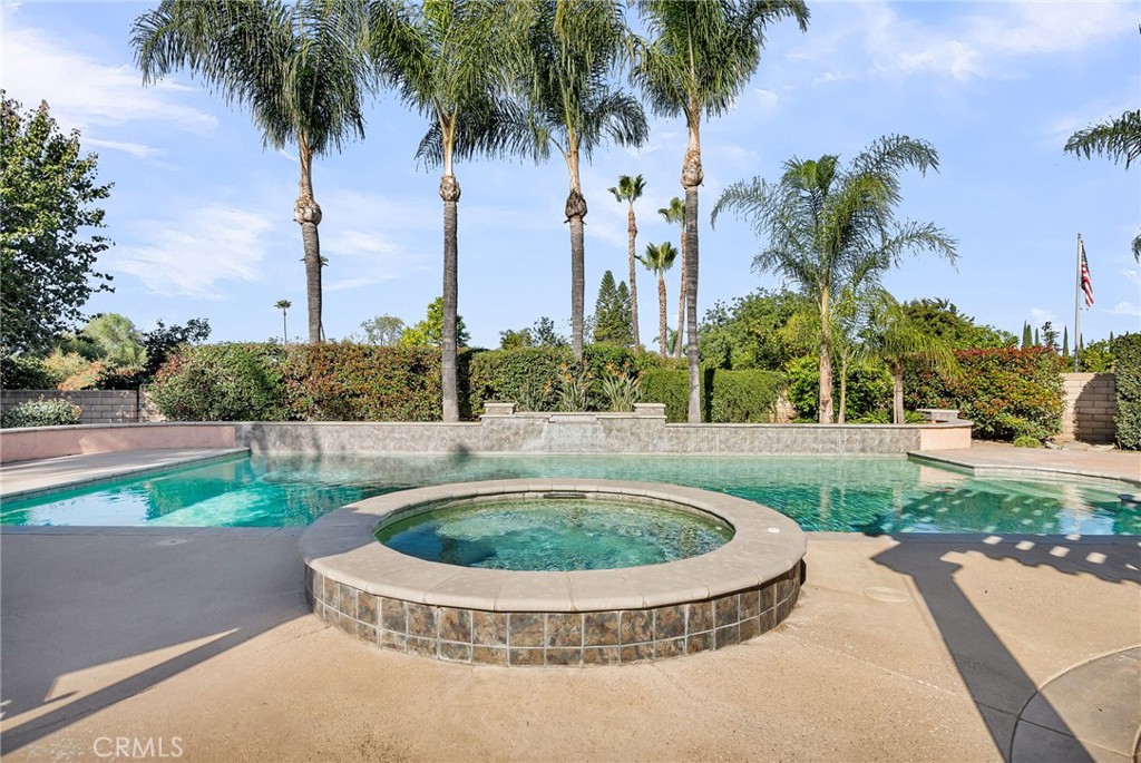 2542 Adage Way Riverside, CA 92506 - Photo 43 of 59 a view of a swimming pool with a yard