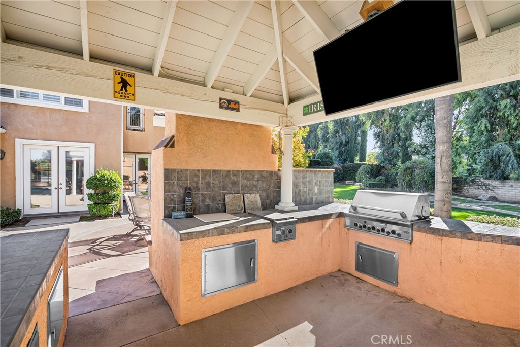 2542 Adage Way Riverside, CA 92506 - Photo 46 of 59 a kitchen that has a sink and a stove