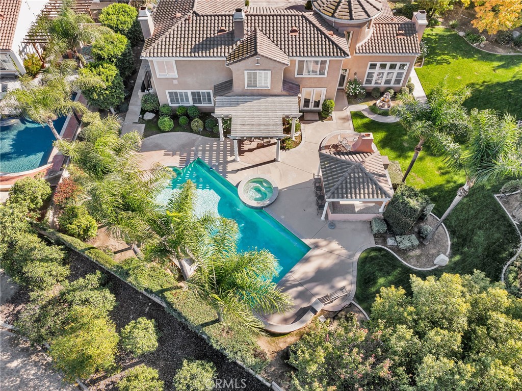 2542 Adage Way Riverside, CA 92506 - Photo 52 of 59 an aerial view of a house with a yard