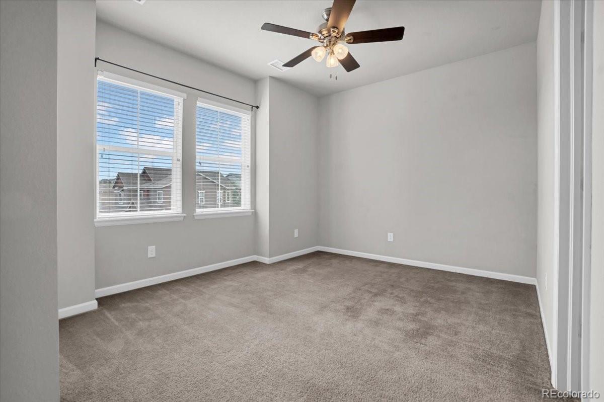 1767 Ghost Dance Circle Castle Rock, CO 80108 - Photo 25 of 48 a view of an empty room with a window