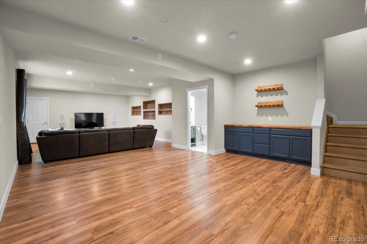 1767 Ghost Dance Circle Castle Rock, CO 80108 - Photo 34 of 48 a view of kitchen with wooden floor