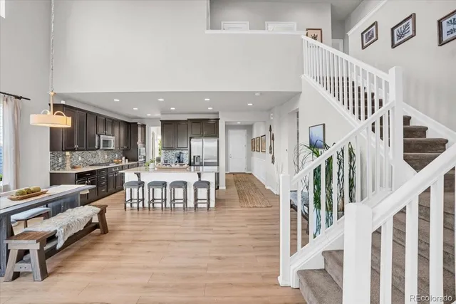 a bedroom with a bed and a table