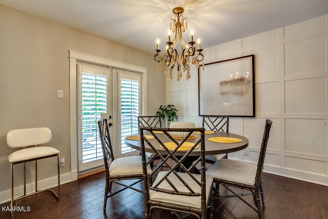 433 Smith Road Knoxville, TN 37934 - Photo 12 of 42 a view of a dining room with furniture window and wooden floor