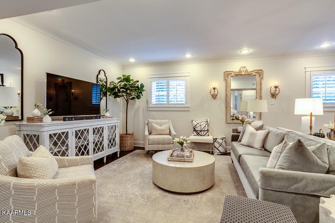 433 Smith Road Knoxville, TN 37934 - Photo 14 of 42 a living room with furniture and a flat screen tv