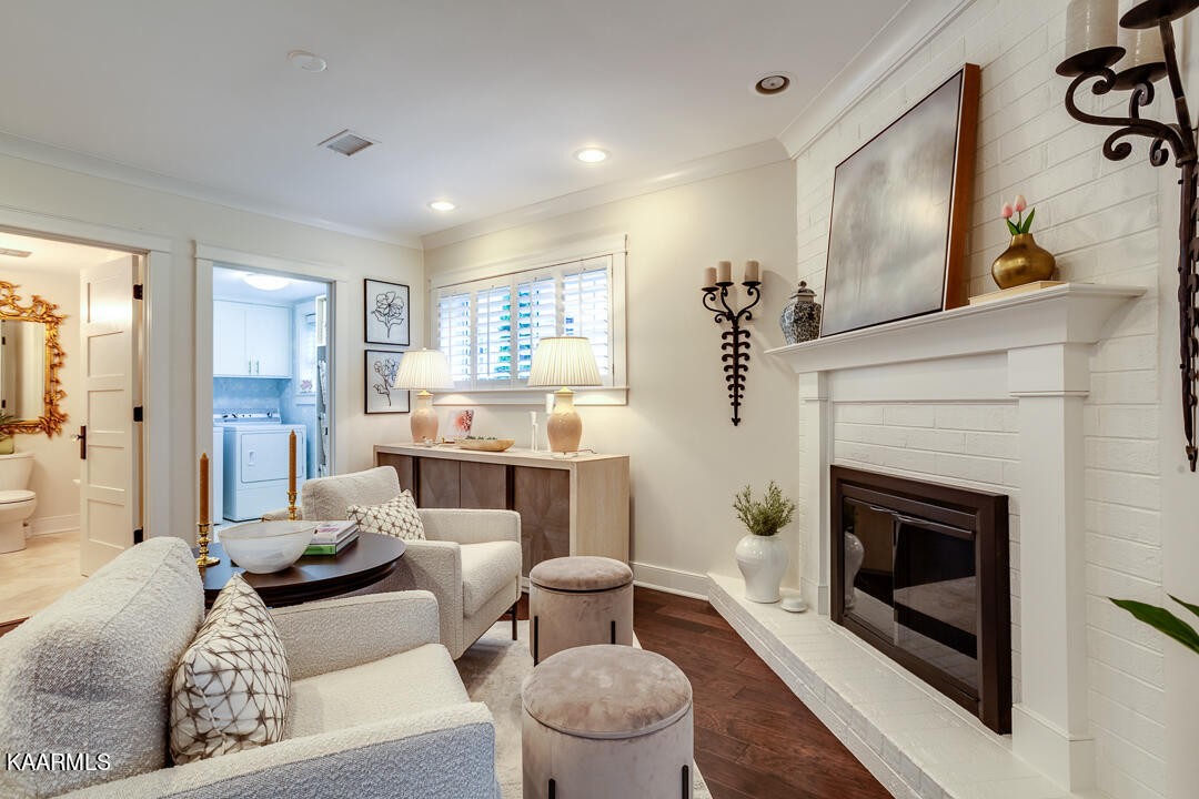 433 Smith Road Knoxville, TN 37934 - Photo 18 of 42 a living room with furniture and a fireplace