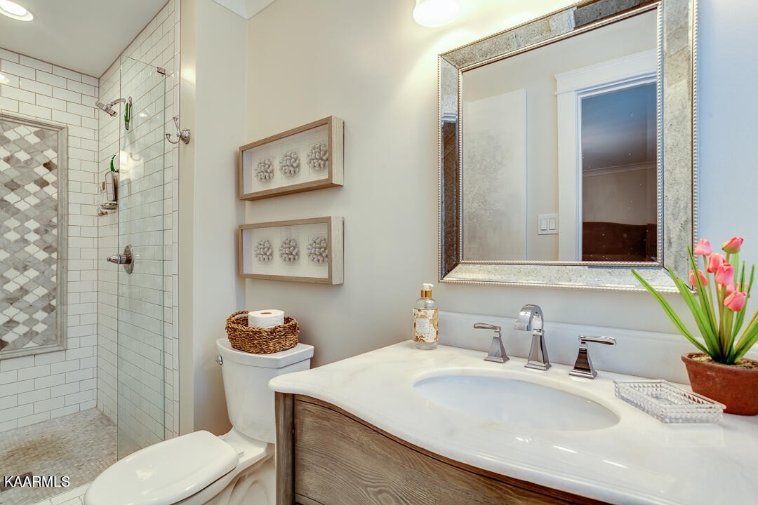433 Smith Road Knoxville, TN 37934 - Photo 25 of 42 a bathroom with a sink toilet and shower