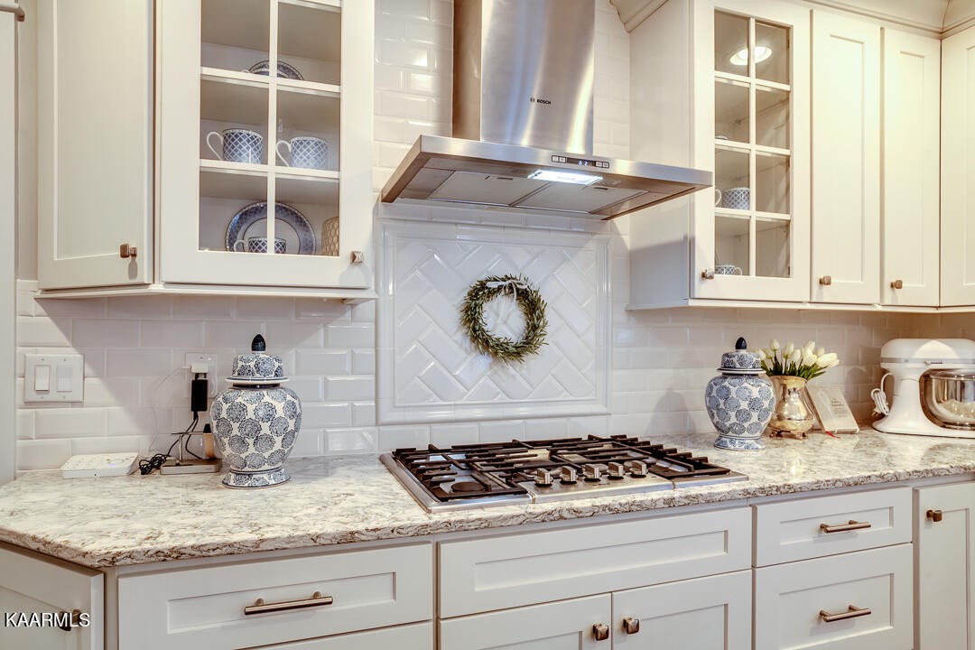 433 Smith Road Knoxville, TN 37934 - Photo 9 of 42 a kitchen with granite countertop stainless steel appliances stove and cabinets