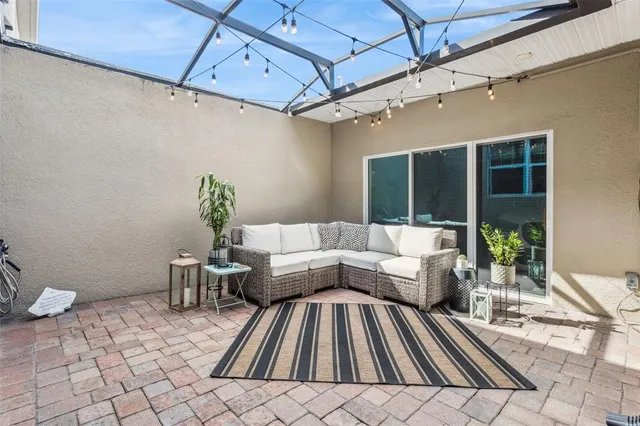 a spacious bedroom with a bed and a window