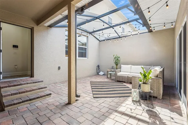 a bathroom with a granite countertop sink mirror and vanity