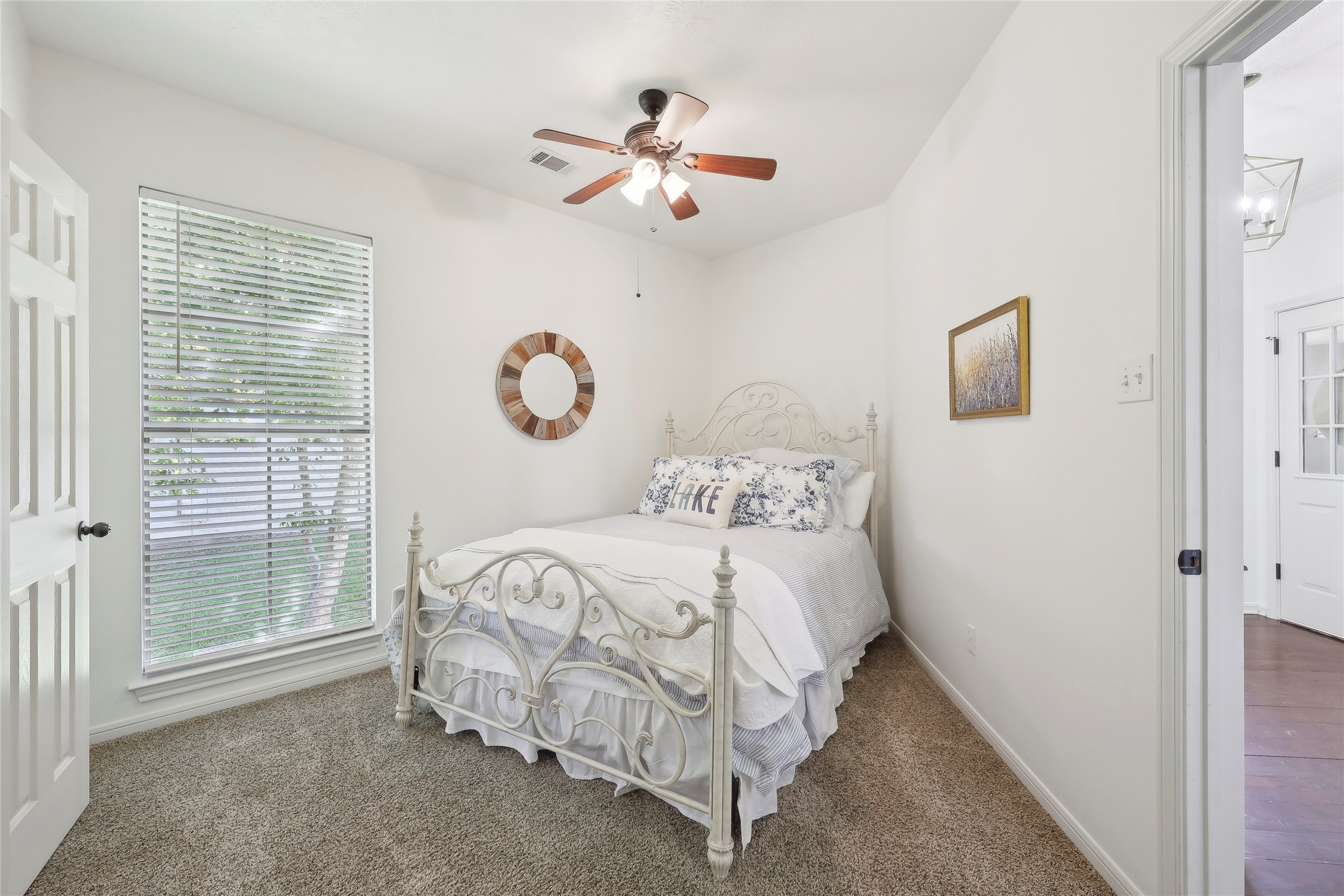 243 Riverbirch Brookeland, TX 75931 - Photo 17 of 47 a bedroom with a bed and a window