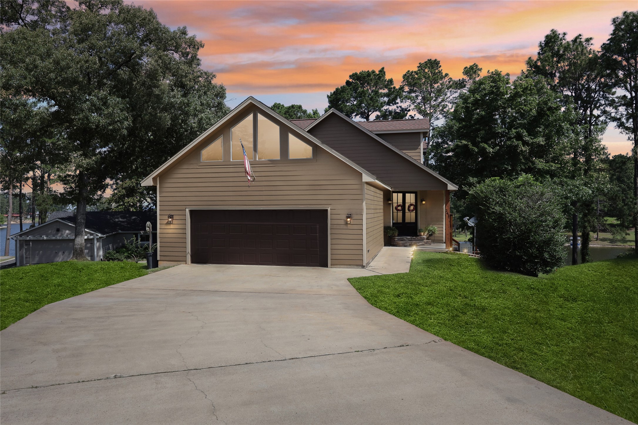 243 Riverbirch Brookeland, TX 75931 - Photo 42 of 47 a front view of house with yard and green space