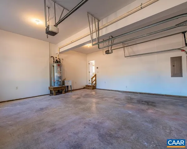 a view of a balcony with wooden floor and fence