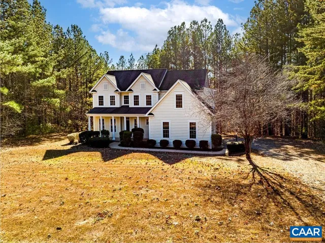 a view of a lake with a building in the background