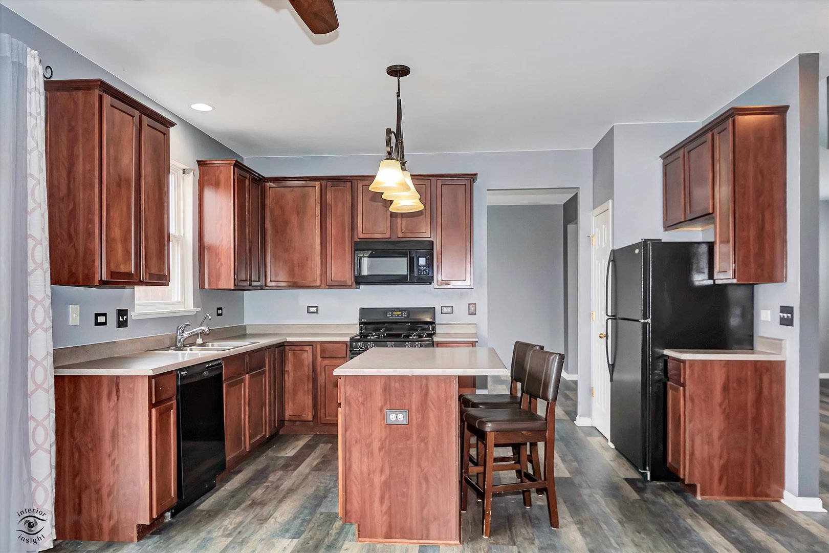 17840 Sorrel Drive Lockport, IL 60441 - Photo 12 of 27 a kitchen with a sink a counter space appliances and cabinets