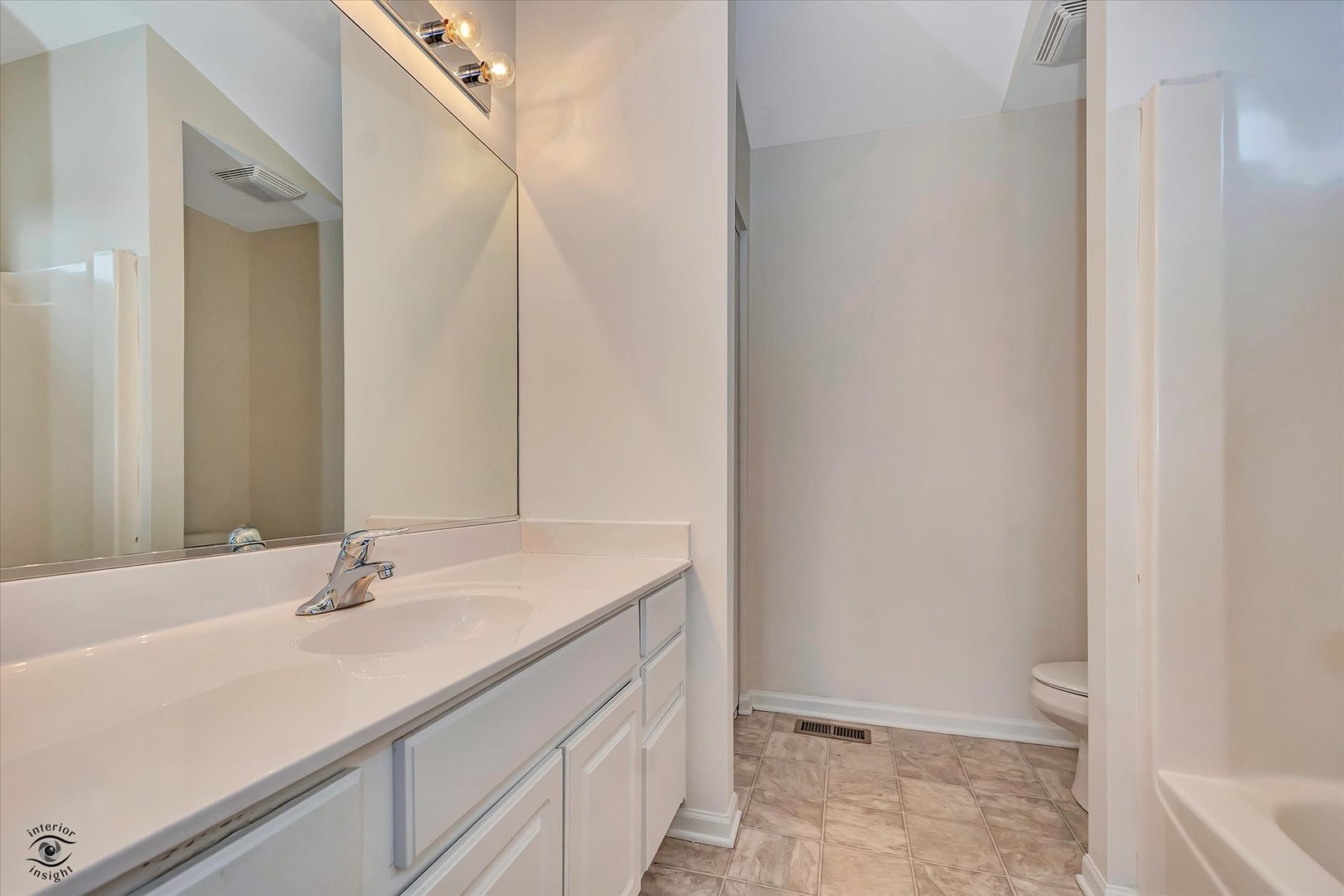 17840 Sorrel Drive Lockport, IL 60441 - Photo 22 of 27 a bathroom with a sink and a mirror