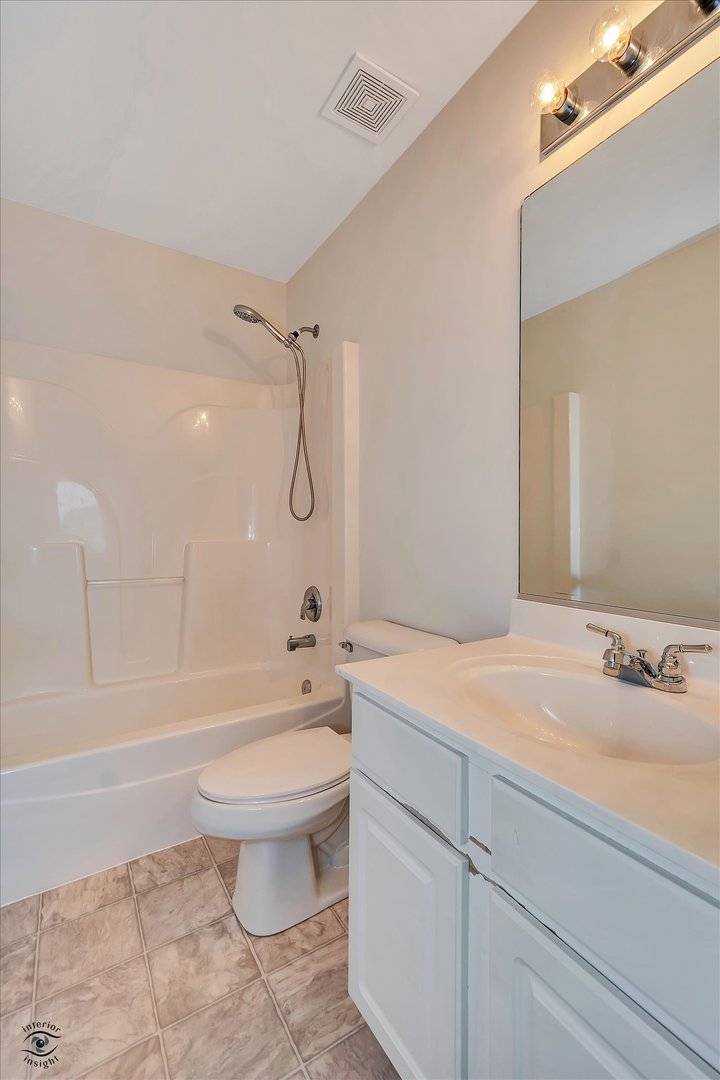 17840 Sorrel Drive Lockport, IL 60441 - Photo 26 of 27 a bathroom with a sink toilet and shower