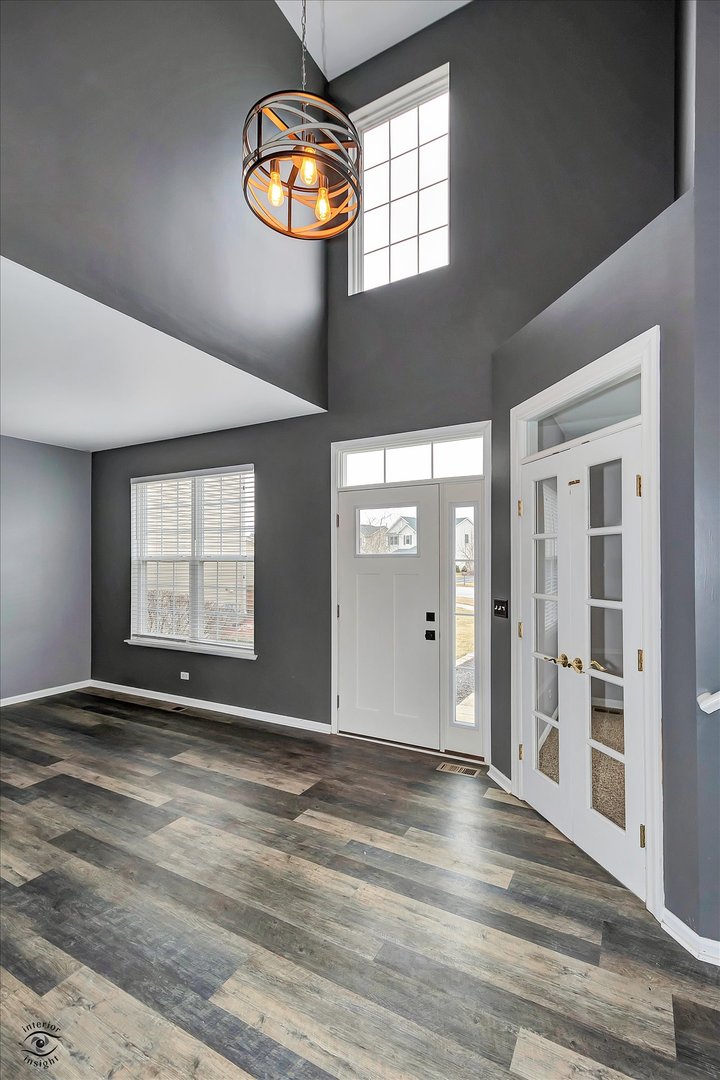 17840 Sorrel Drive Lockport, IL 60441 - Photo 3 of 27 an empty room with wooden floor and windows