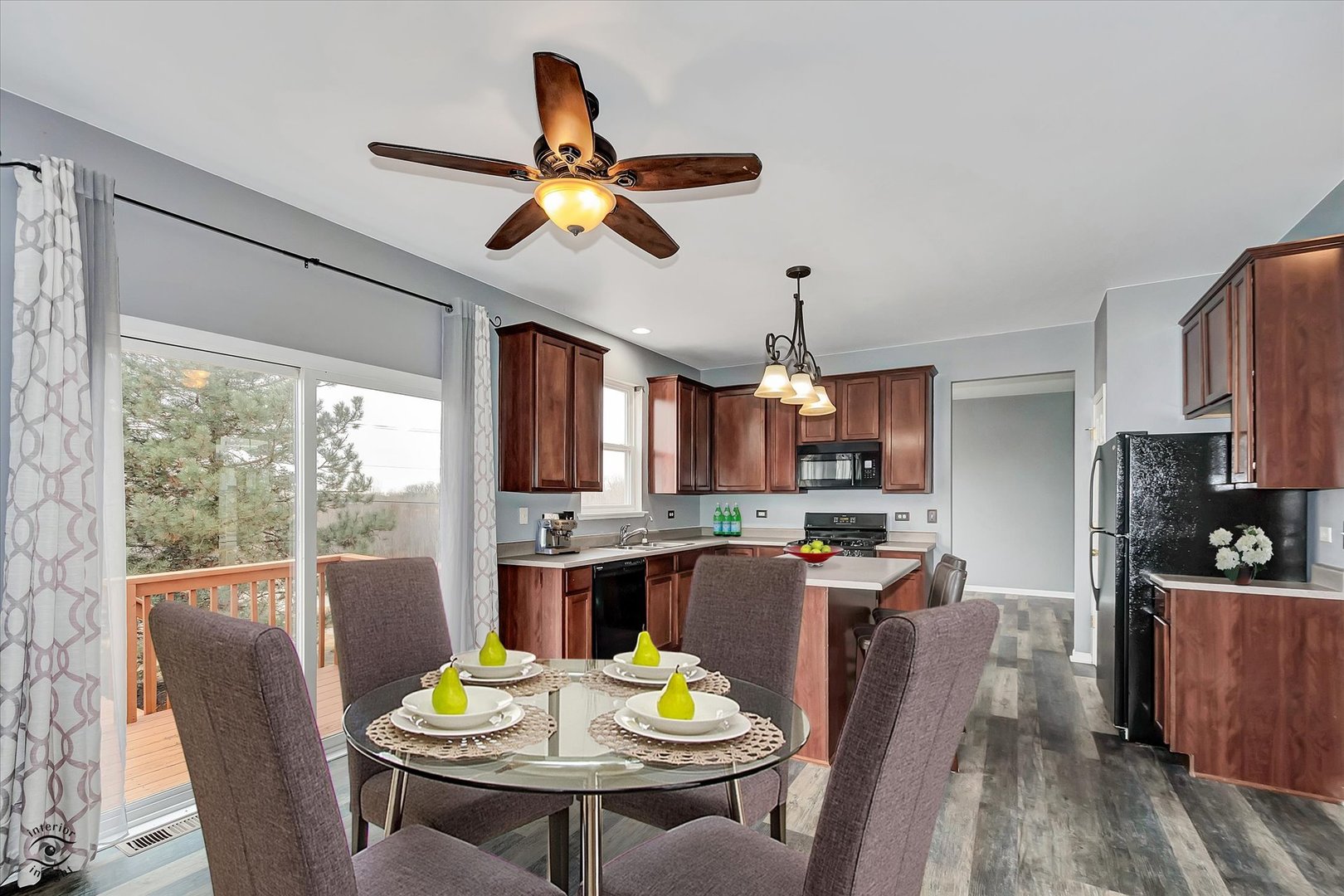 17840 Sorrel Drive Lockport, IL 60441 - Photo 10 of 27 a view of a dining room with furniture a rug and wooden floor